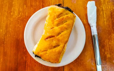 Tipik Meksika yemekleri Tortas Tacos Empanadas rollos and Tamales in El Cafecito, Zicatela Puerto Escondido Oaxaca Mexico.