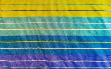 Playa del Carmen Quintana Roo Meksika 'da renkli mor çizgili masa örtüsü dokusu.