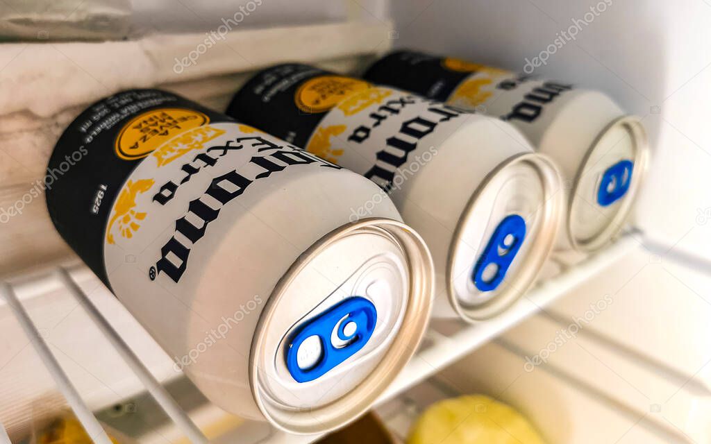 Playa del Carmen Mexico 15. May 2021 Corona beer bottle bottles can cans six food and drink in the fridge bar or restaurant in Playa del Carmen Quintana Roo Mexico.