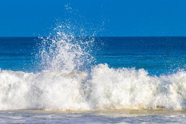 Extremely huge big powerful surfer waves on the beach in Zicatela Puerto Escondido Oaxaca Mexico.