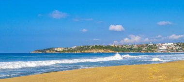 Extremely huge big powerful surfer waves on the beach in Zicatela Puerto Escondido Oaxaca Mexico.