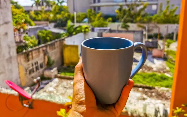 Blue coffee cup in a Mexican apartment in Playa del Carmen.