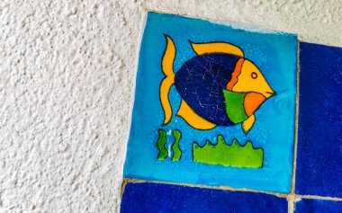 Beautiful colorful tiles with pictures in Zicatela Puerto Escondido Oaxaca Mexico. clipart
