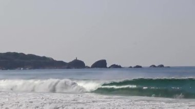Extremely huge big surfer waves on the beach at La Punta de Zicatela Puerto Escondido Oaxaca Mexico.