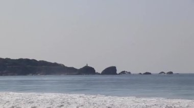 Extremely huge big surfer waves on the beach at La Punta de Zicatela Puerto Escondido Oaxaca Mexico.