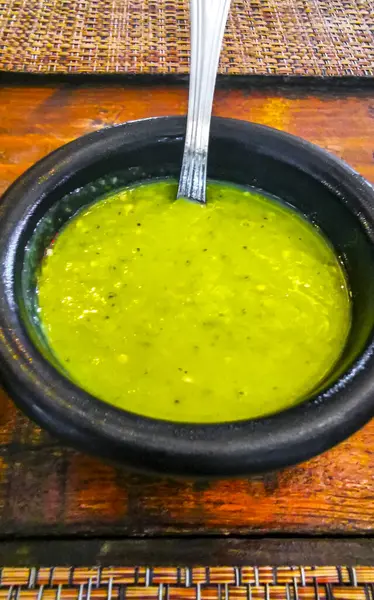 stock image Spicy green Mexican coriander cilantro sauce in Playa del Carmen Quintana Roo Mexico.