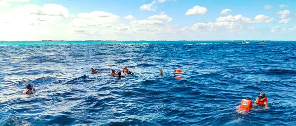 stock image Cancun Quintana Roo Mexico 24. January 2022 People snorkeling swimming in the open sea on Isla Mujeres island in Cancun Quintana Roo Mexico.