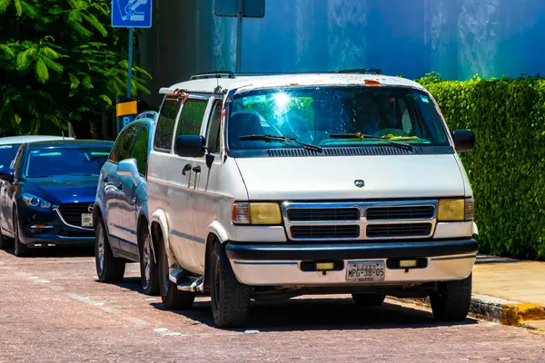 stock image Various minibuses minibus van vans transporters vehicles car cars in Playa del Carmen Quintana Roo Mexico.