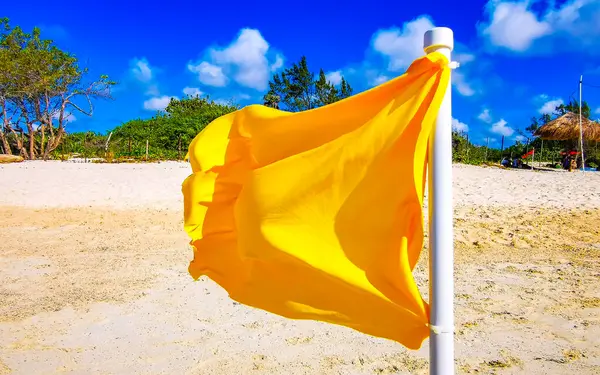 stock image Yellow flag swimming prohibited high waves in Playa del Carmen Quintana Roo Mexico.