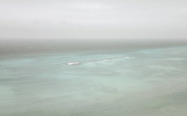 Coral reef Palancar seascape and Caribbean sea panorama with turquoise green and blue water and waves in Playa del Carmen Quintana Roo Mexico. clipart