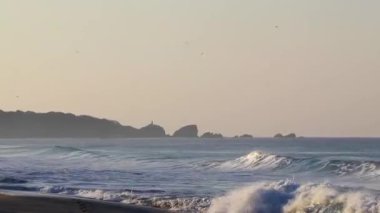 Extremely huge big surfer waves on the beach at La Punta de Zicatela Puerto Escondido Oaxaca Mexico.