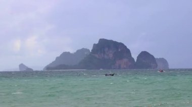 Beautiful tropical paradise panorama view on turquoise water beach and between limestone rocks on Ao Nang Beach in Amphoe Mueang Krabi Thailand in Southeast Asia.