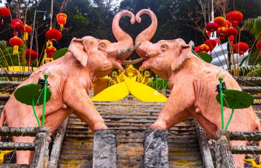 Ao Nang Krabi Thailand 19. October 2018 Elephant statues sculptures at Wat Phu Khao Phra Maha Phothisat Chinese temple on the hill in Ao Nang Amphoe Mueang Krabi Thailand in Southeast Asia. clipart