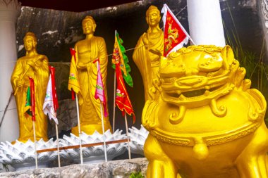 Ao Nang Krabi Thailand 19. October 2018 Religious figures Sculptures and statues at Wat Phu Khao Phra Maha Phothisat Chinese temple on the hill in Ao Nang Amphoe Mueang Krabi Thailand. clipart