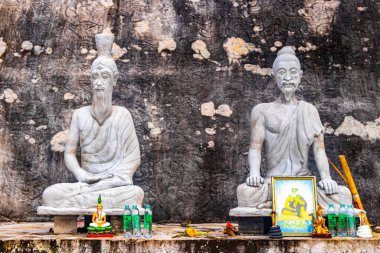 Ao Nang Krabi Thailand 19. October 2018 Unfinished unpainted religious figures Sculptures and statues at Wat Phu Khao Phra Maha Phothisat Chinese temple on the hill in Ao Nang Amphoe Mueang Krabi Thailand in Southeast Asia. clipart