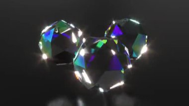 Siyah bg üzerindeki üç değerli taş sonsuz 4k ile dönüyor.