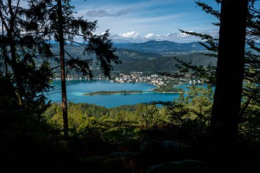 View Over Lake Woerthersee(Wrther See) And Village Poertschach In Carinthia In Austria clipart