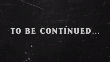 Retro Outro 'da. Sessiz sinema döneminden bir film çerçevesi oluşturuldu, devam edecek bir başlık metni gösteriliyor. Klasik film hasarı ve çizikler. Outro.