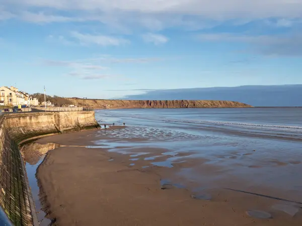 stock image View over the sandy beach at Filey to Filey Brigg in North Yorkshire, England