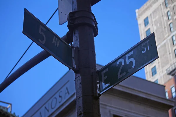 Stock image Green West 25th Street and 5th Avenue Fashion traditional sign in Midtown Manhattan in New York City