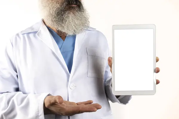doctor holds transparent tablet screen for text