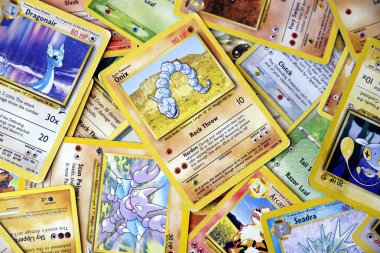 Stockholm, Sweden - August 13, 2024: Pokemon trading cards background clipart