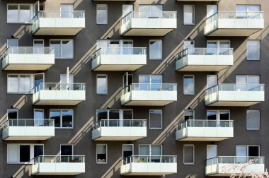 Balconies in apartment residential building clipart