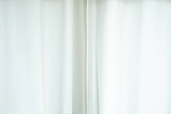close up of white curtain in the room at home with sunlight