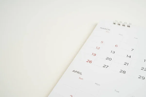 stock image close up of calendar on the white table background, planning for business meeting or travel planning concept