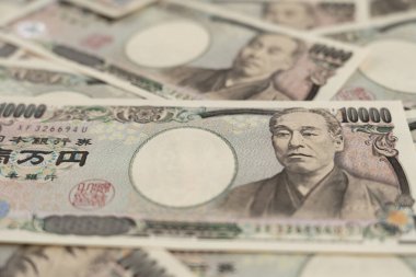 Japon banknotlarını kapat. Bir tomar fatura. Bankalar, finans ve Japon ekonomisi konulu arka plan