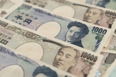 Japon banknotlarını kapat. Bir tomar fatura. Bankalar, finans ve Japon ekonomisi konulu arka plan