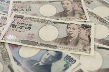 Japon banknotlarını kapat. Bir tomar fatura. Bankalar, finans ve Japon ekonomisi konulu arka plan
