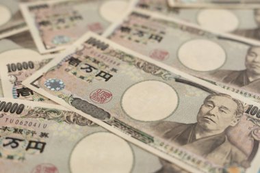 Japon banknotlarını kapat. Bir tomar fatura. Bankalar, finans ve Japon ekonomisi konulu arka plan