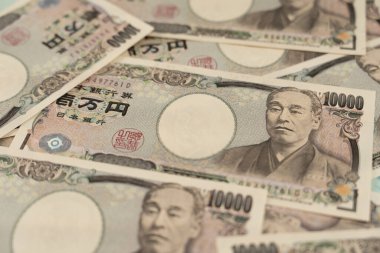 Japon banknotlarını kapat. Bir tomar fatura. Bankalar, finans ve Japon ekonomisi konulu arka plan