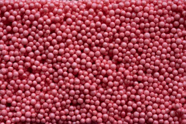 Close Red Foam Beads Background Лицензионные Стоковые Изображения
