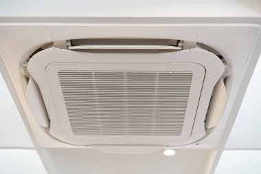 Close up air conditioning central system installed on the ceiling