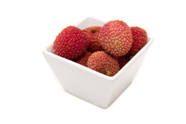 lychee inside square bowl on a white background