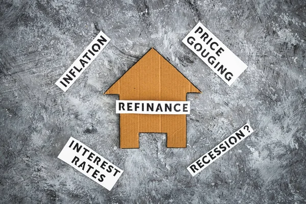 house with refinance text surrounded by concepts like interest rates inflation recession and price gouging, worldwide economic issues after the pandemic