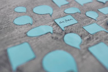 pronouns she her in blue speech bubbles surrounded by other empty or anonymous ones, concept of respecting people's identity in society or coming out