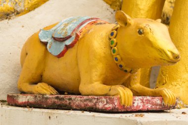 golden rat statue in Thai temple clipart
