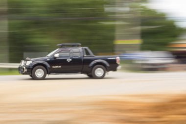 pick-up Speeding in road, panning camera, Thailand asia