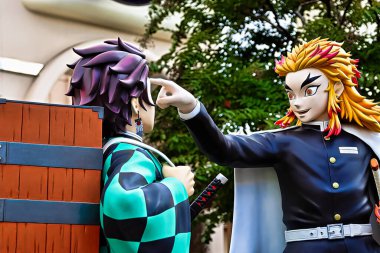 Osaka,Japan - Nov 5,2021 : Statue of Kyojuro Rengoku and Tanjiro Kamado : Demon Slayer(