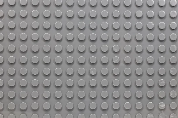 stock image Grey plastic constructor blocks plate seamless pattern flat design. Full frame