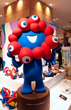 OSAKA, JAPAN - AUGUST 22, 2025 : Editorial photograph of the exteriors of various pavilions and exhibits showcasing a vision of the future at the 2025 Osaka, Kansai Expo.