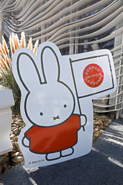 OSAKA, JAPAN - AUGUST 22, 2025 : Editorial photograph of the exteriors of various pavilions and exhibits showcasing a vision of the future at the 2025 Osaka, Kansai Expo.