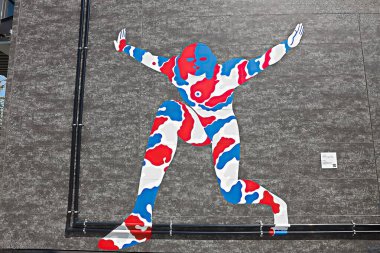 OSAKA, JAPAN - AUGUST 22, 2025 : Editorial photograph of the exteriors of various pavilions and exhibits showcasing a vision of the future at the 2025 Osaka, Kansai Expo.