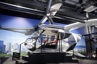 OSAKA, JAPAN - AUGUST 22, 2025 : Editorial photograph of the exteriors of various pavilions and exhibits showcasing a vision of the future at the 2025 Osaka, Kansai Expo.