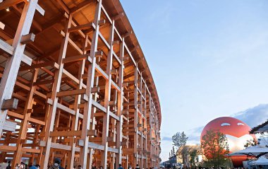 OSAKA, JAPAN - AUGUST 22, 2025 : Editorial photograph of the exteriors of various pavilions and exhibits showcasing a vision of the future at the 2025 Osaka, Kansai Expo.