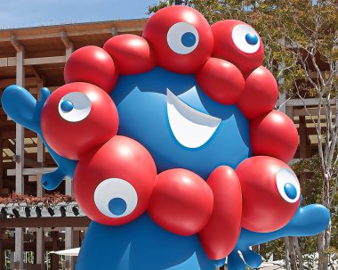 OSAKA, JAPAN - AUGUST 22, 2025 : Editorial photograph of the exteriors of various pavilions and exhibits showcasing a vision of the future at the 2025 Osaka, Kansai Expo.