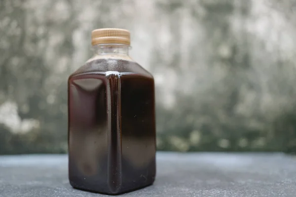 Plastic bottle of cold brew coffee. Close up